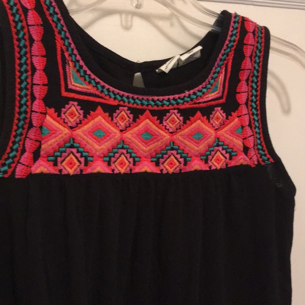 Embroidered tank.